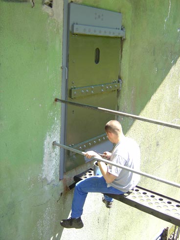 Mise en peinture de la porte blind�e
